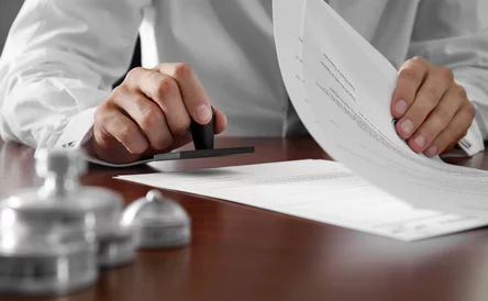 Notary public in office stamping documents